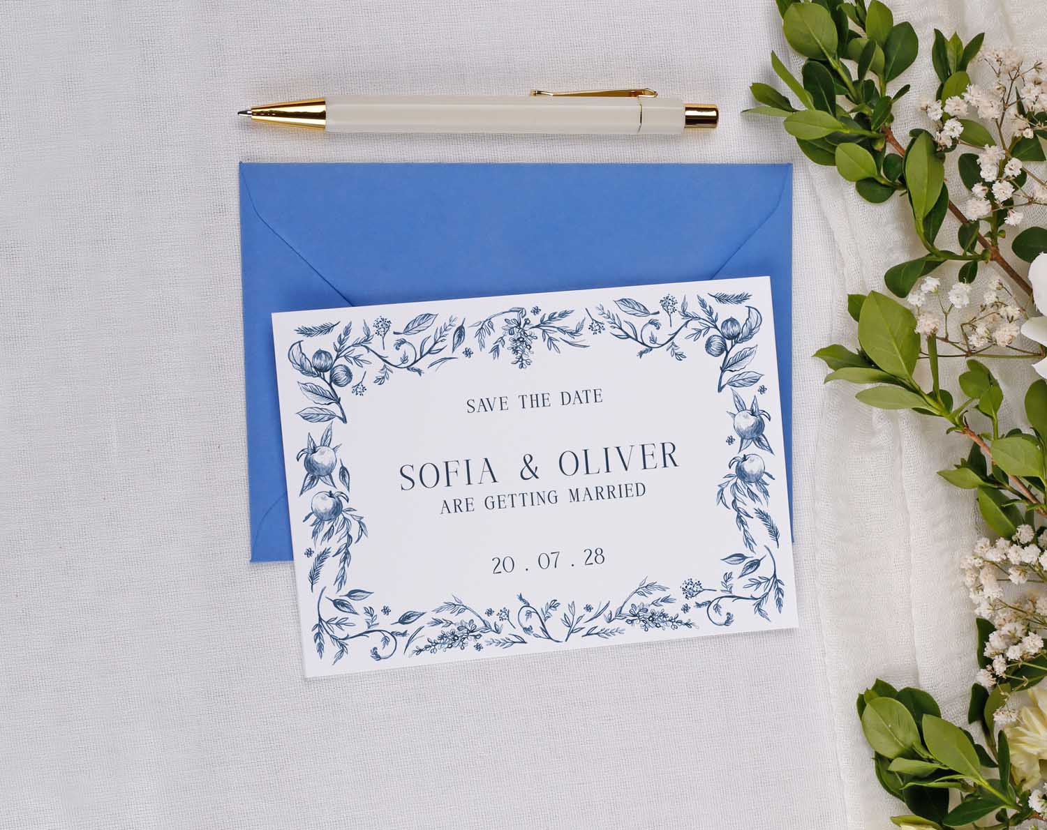 Blue Garden Wedding Save The Date cards featuring floral design on a white background with a blue envelope.