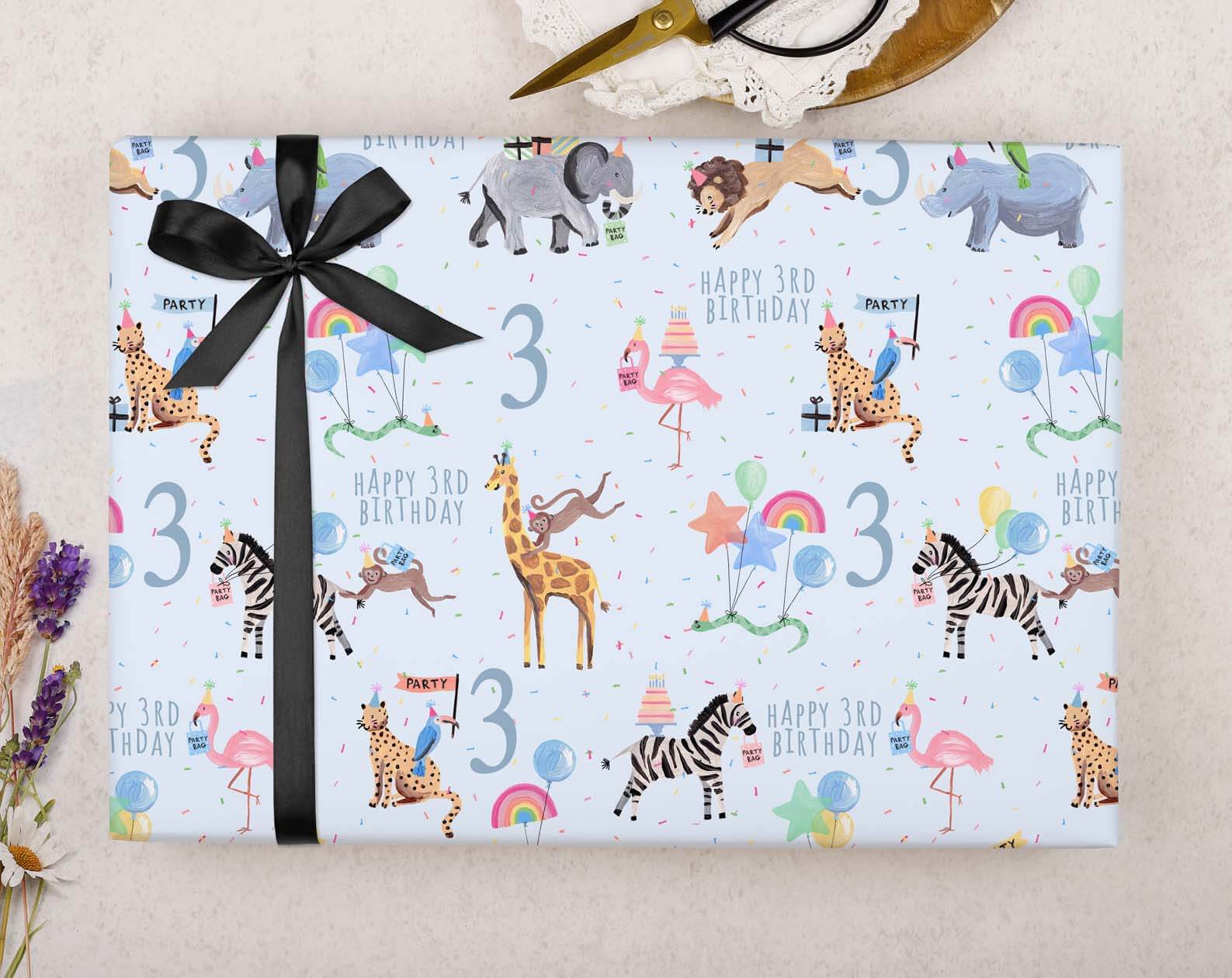 Blue Safari Animal 3rd Birthday Wrapping Paper. Wrapping Paper designed by Making Meadows