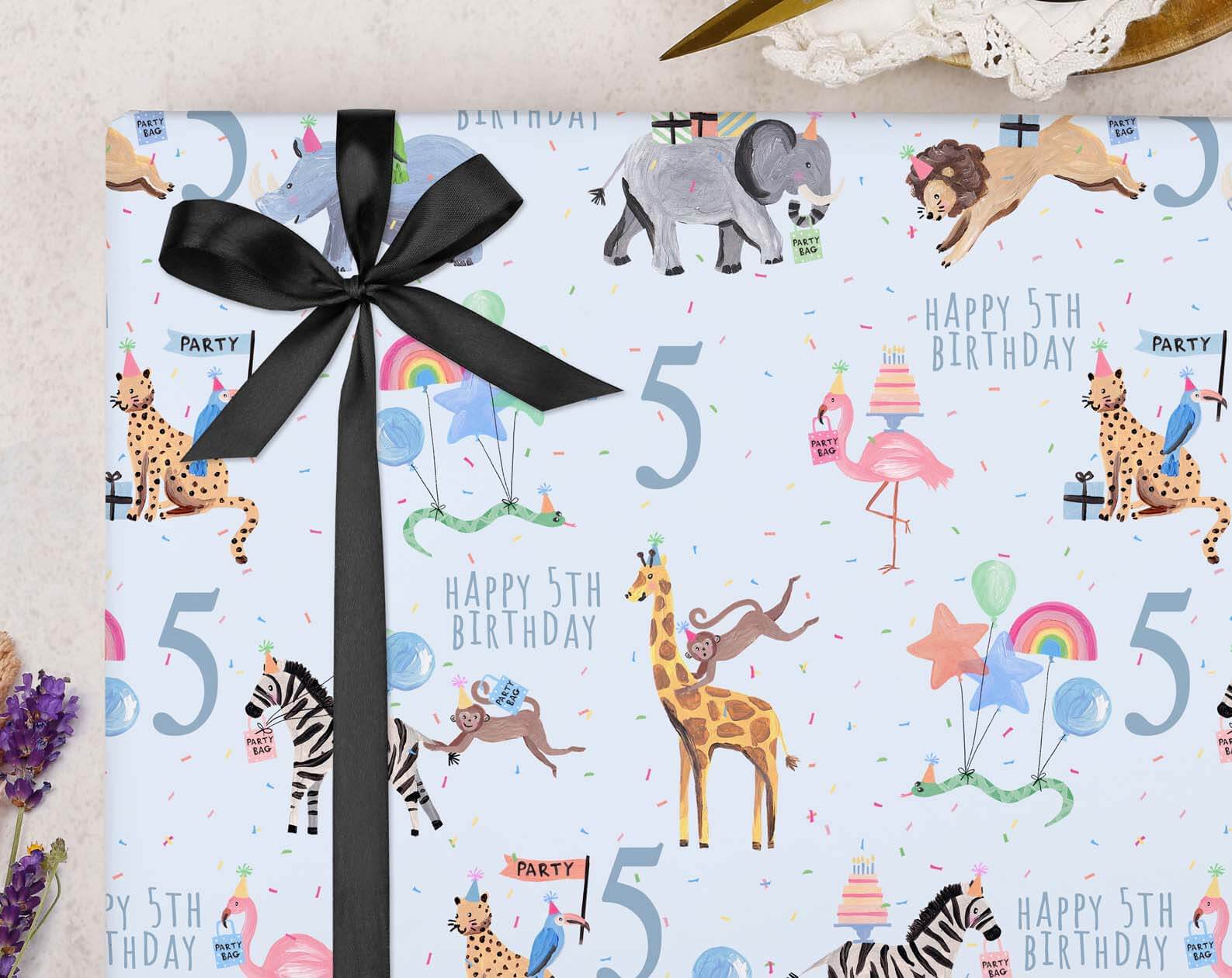 Blue Safari Animal 5th Birthday Wrapping Paper. Wrapping Paper designed by Making Meadows