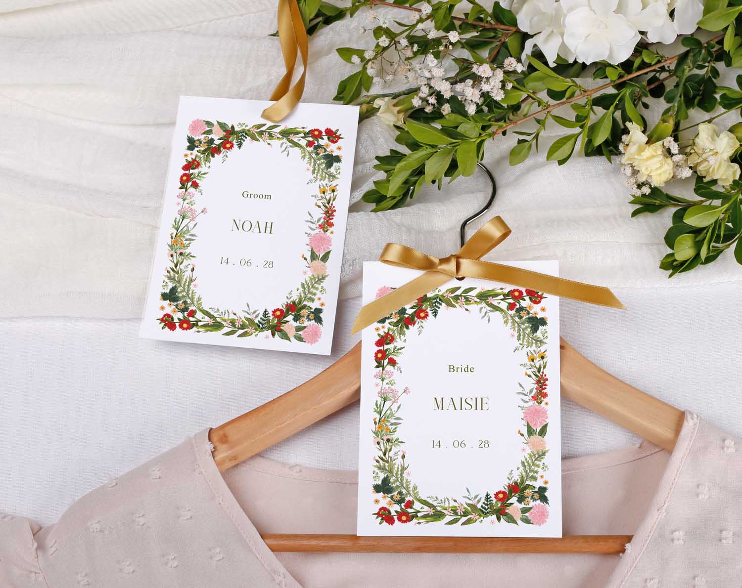 Boho Wedding Hanger Tags for Bride and Groom with floral design and personalized names, perfect for wedding photos.
