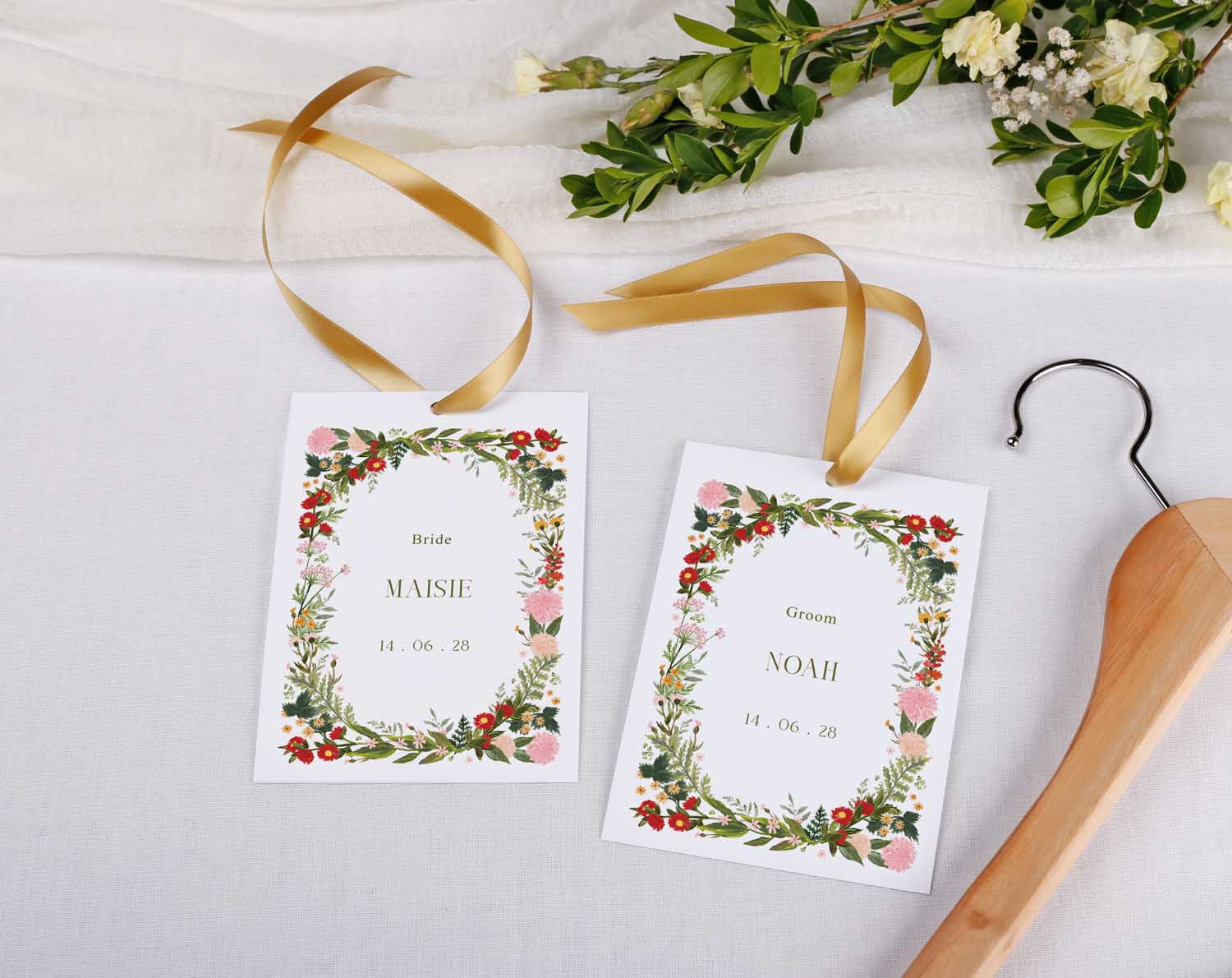 Boho Wedding Hanger Tags for bridal party featuring floral designs and personalized names for bride and groom.