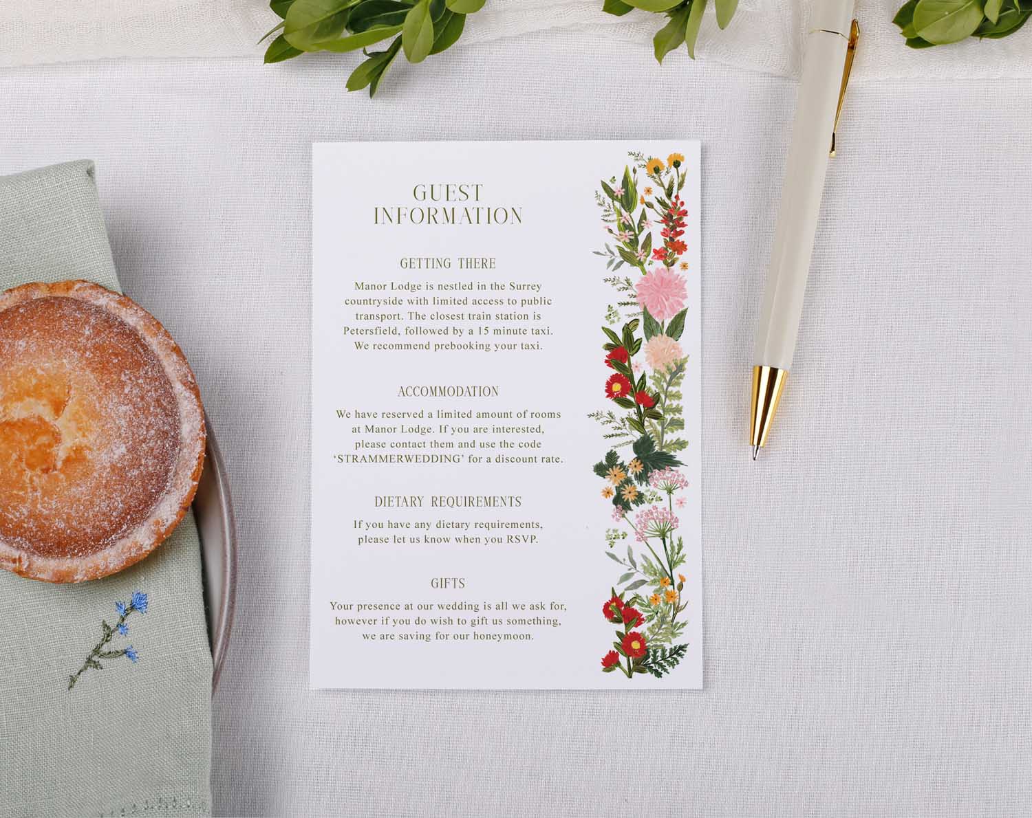 Boho Wedding Information Cards displayed with a pastry and pen on a linen tablecloth.