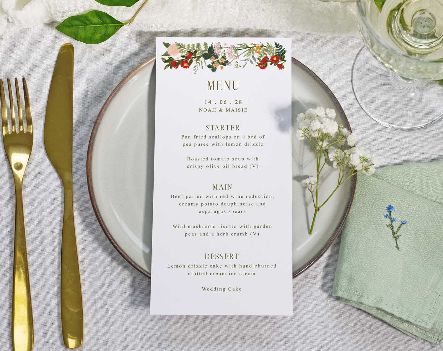 Boho Wedding Menus displayed with beautiful bold floral design and illustrations