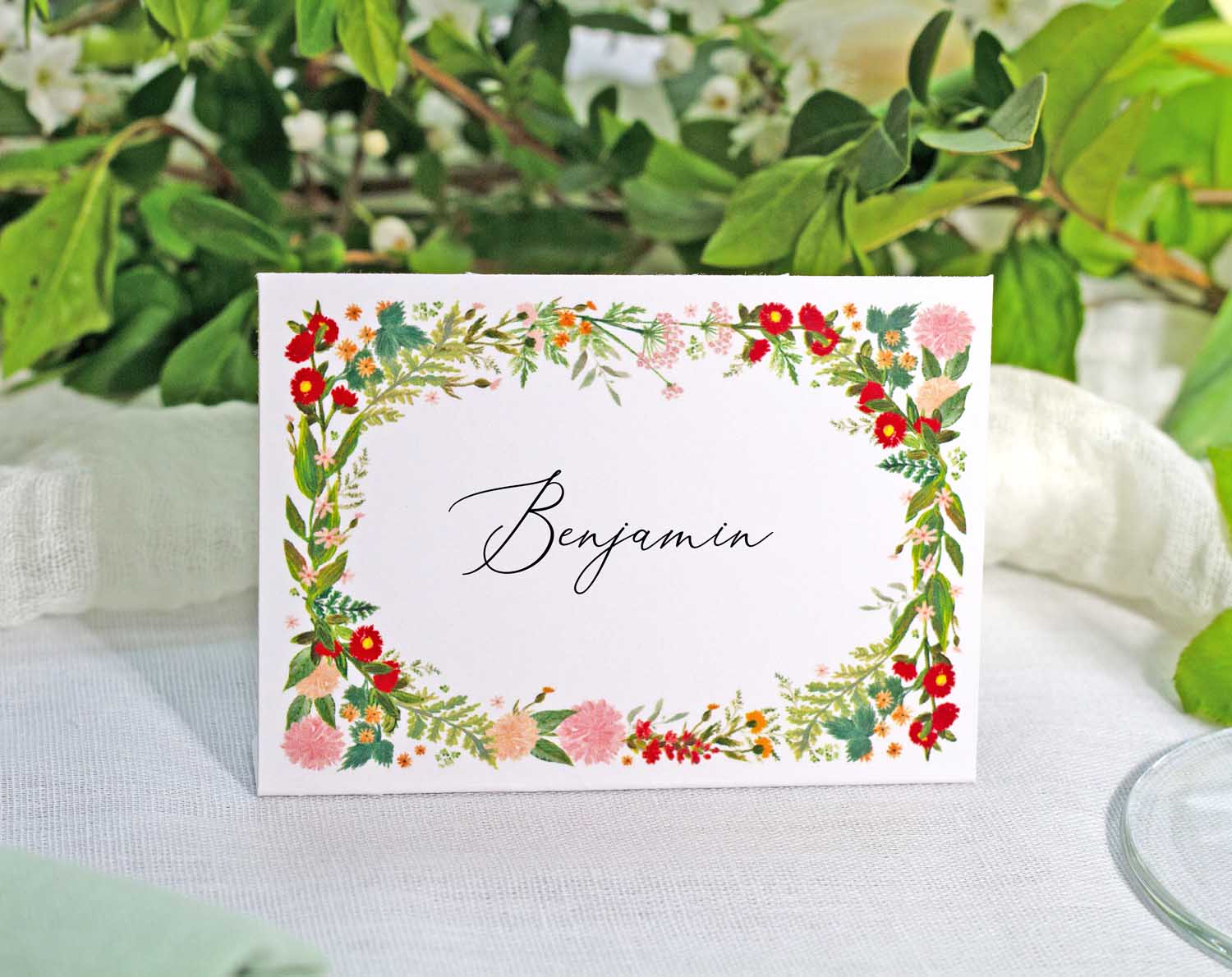 Boho Wedding Place Cards featuring a floral design with vibrant colors for table settings.