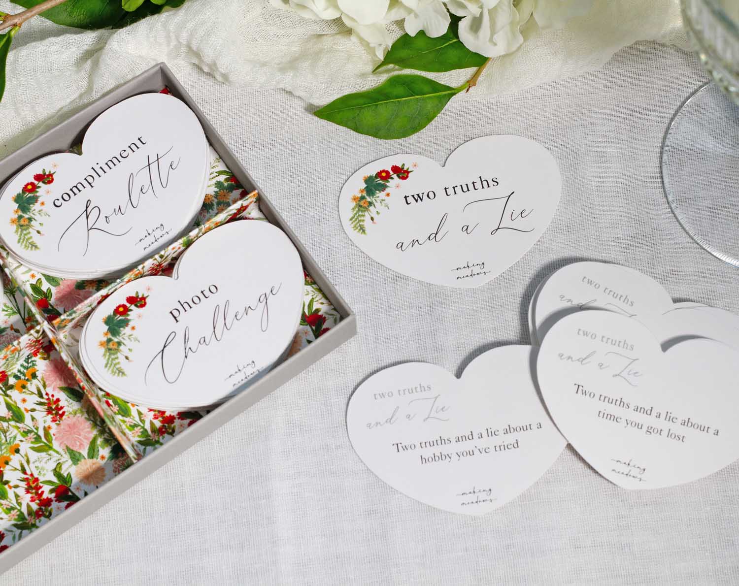 Boho Wedding Table Game with heart-shaped cards for icebreaker activities at weddings.