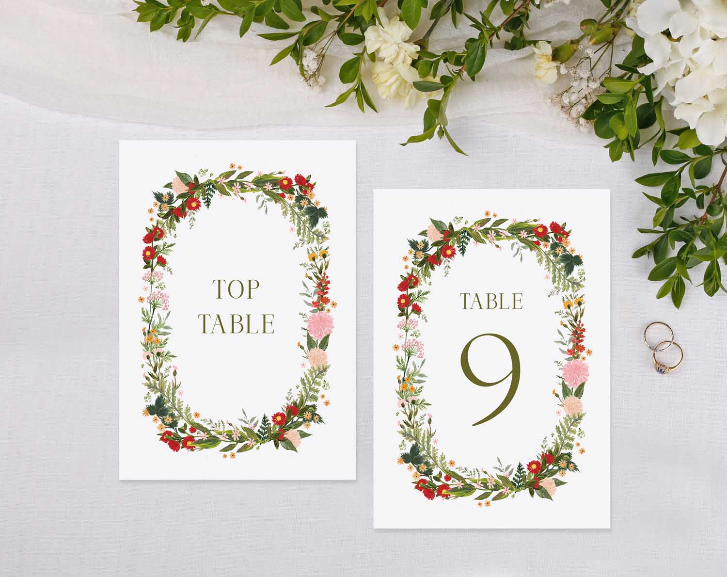 Boho Wedding Table Numbers featuring floral designs for elegant table settings at a reception.