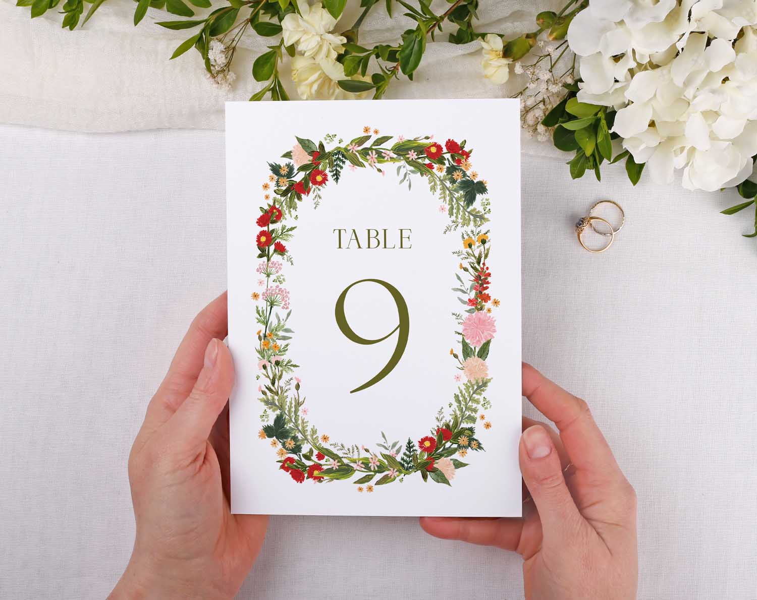 Boho Wedding Table Numbers featuring floral design with a gold number 9 for wedding reception seating.