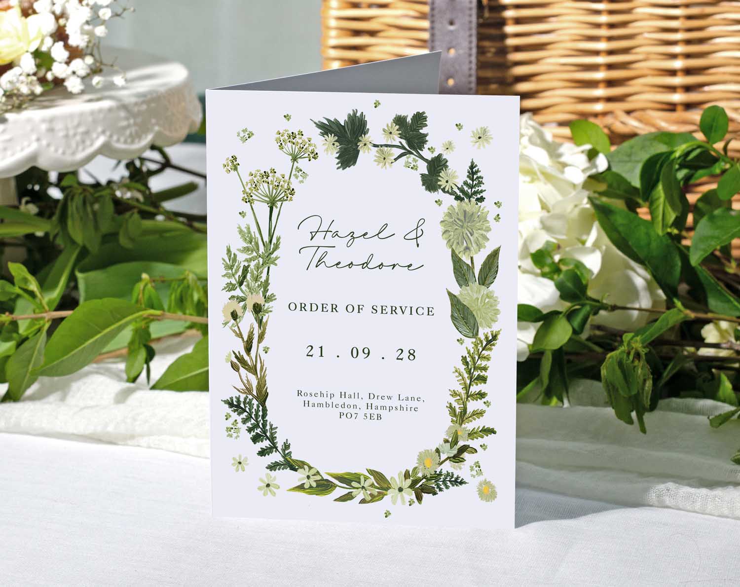 Botanical Order Of Service booklet with greenery and floral design for wedding ceremony by Hazel & Theodore.
