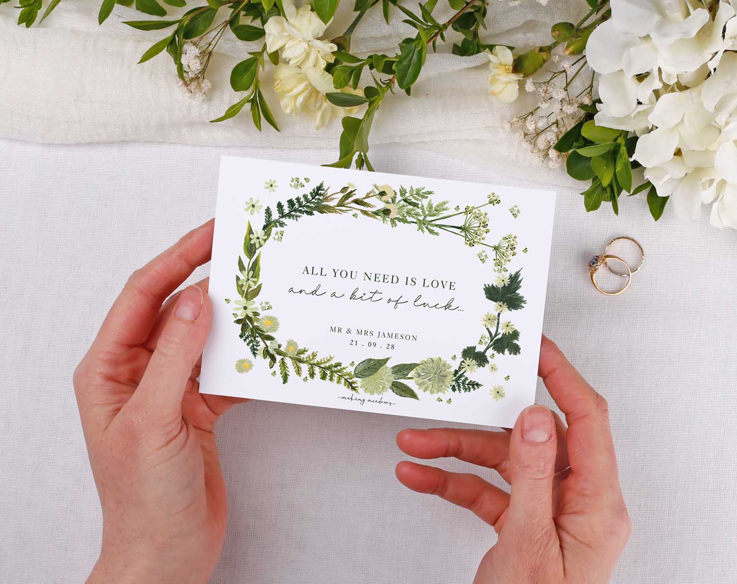 Botanical Scratch Card Envelopes showcasing a personal message for wedding favours with floral design and couple's names.