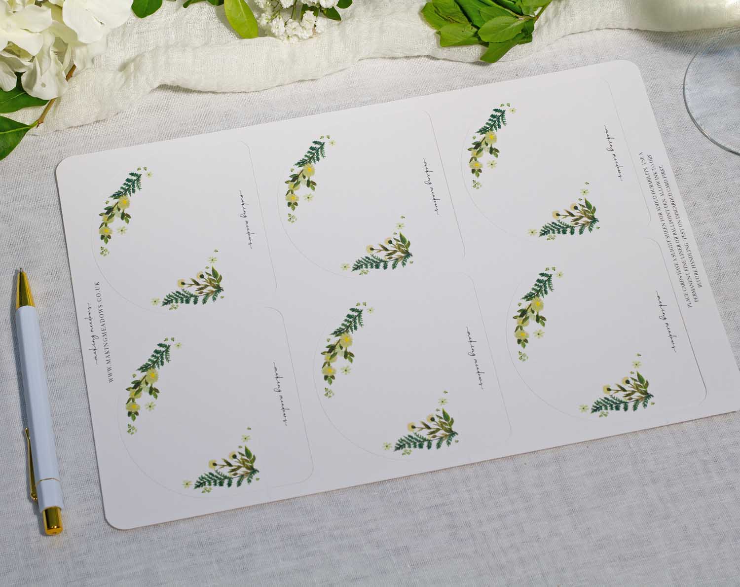 Botanical Wedding Place Cards displayed in a fresh and natural design on a table setting.