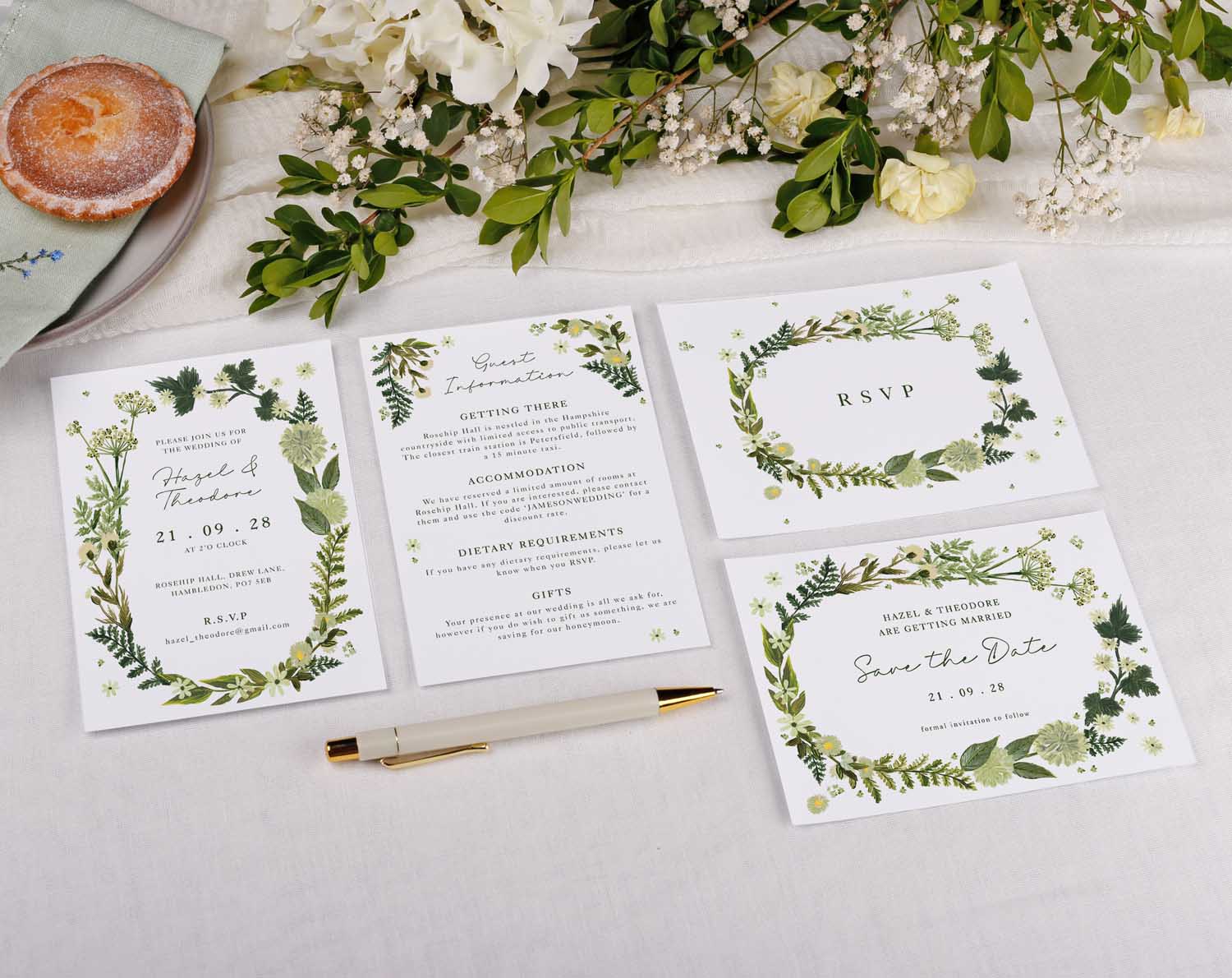 Botanical Wedding RSVP Cards displayed with greenery and floral details on elegant stationery.
