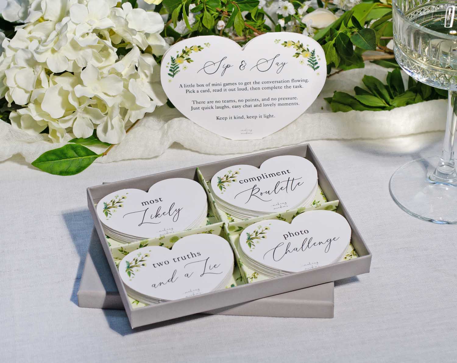 Botanical Wedding Table Game with cards for conversation starter games and icebreakers.