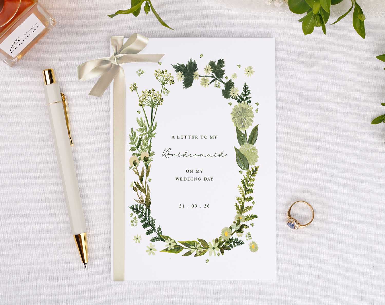 Botanical Wedding Thank You Card featuring a floral design and handwritten message for the bridal party.