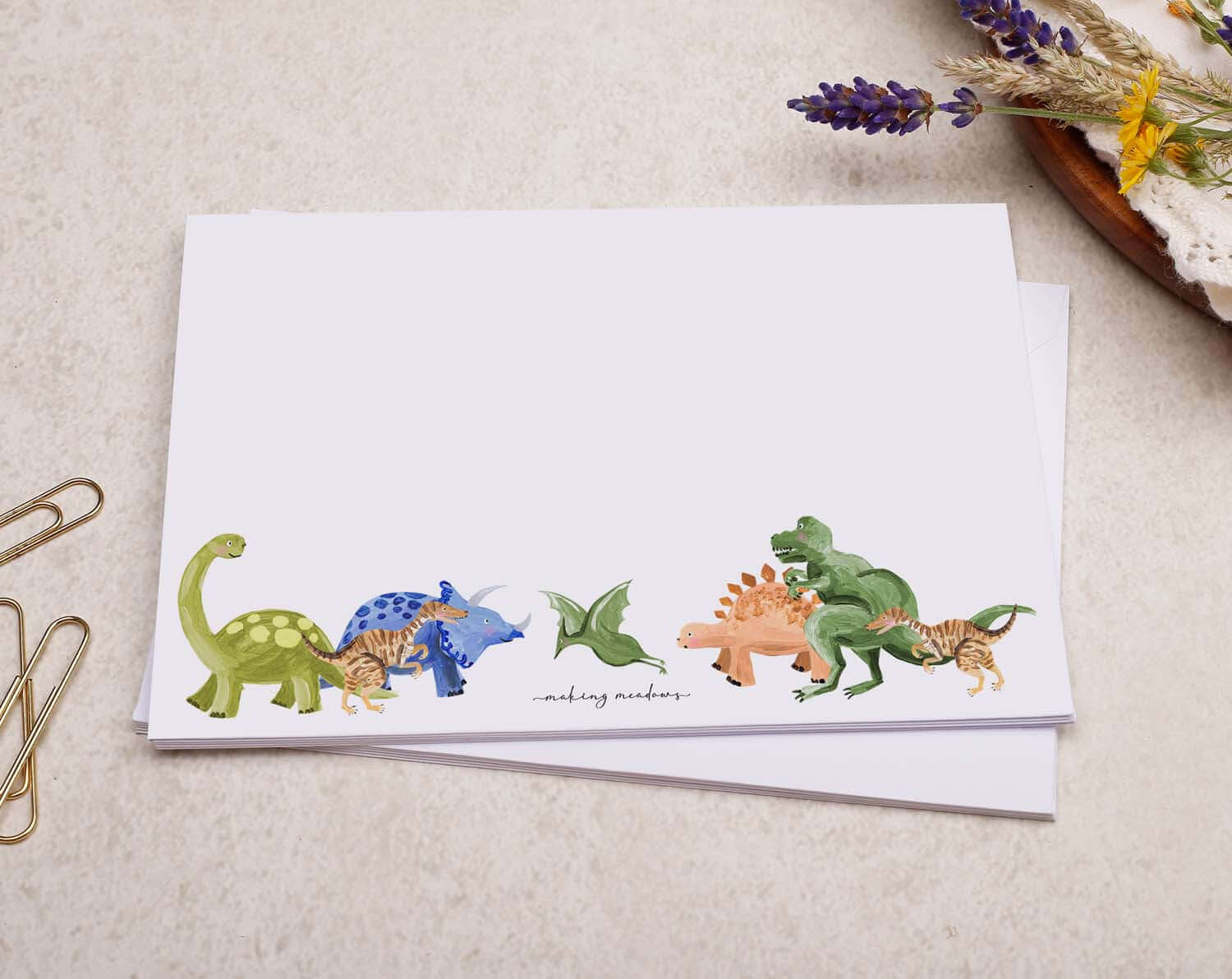 C6 Dinosaur Decorated Envelopes with colorful dinosaur illustrations on a white background.