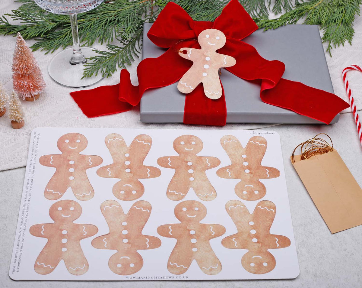 Gingerbread Christmas Gift Tags - 16 Pack featuring gingerbread man designs on gift wrapping.