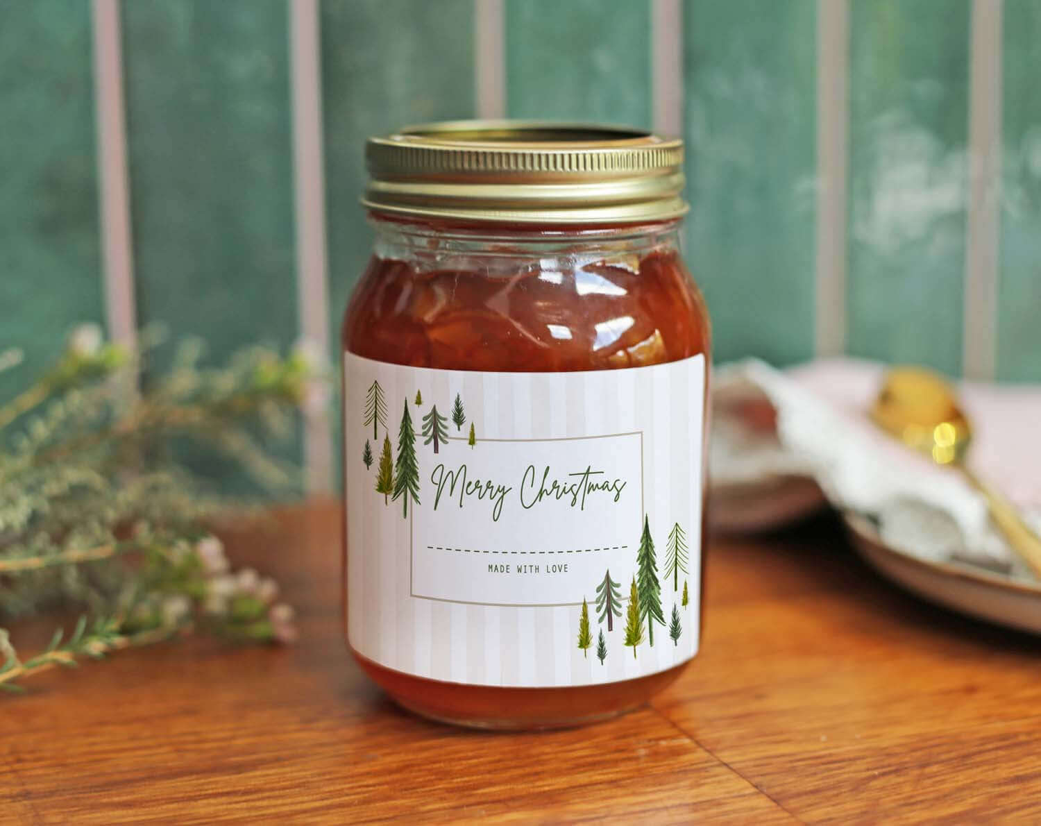 Christmas Jam Jar Labels With Rustic Scandi on a jar with a Merry Christmas design and evergreen trees.