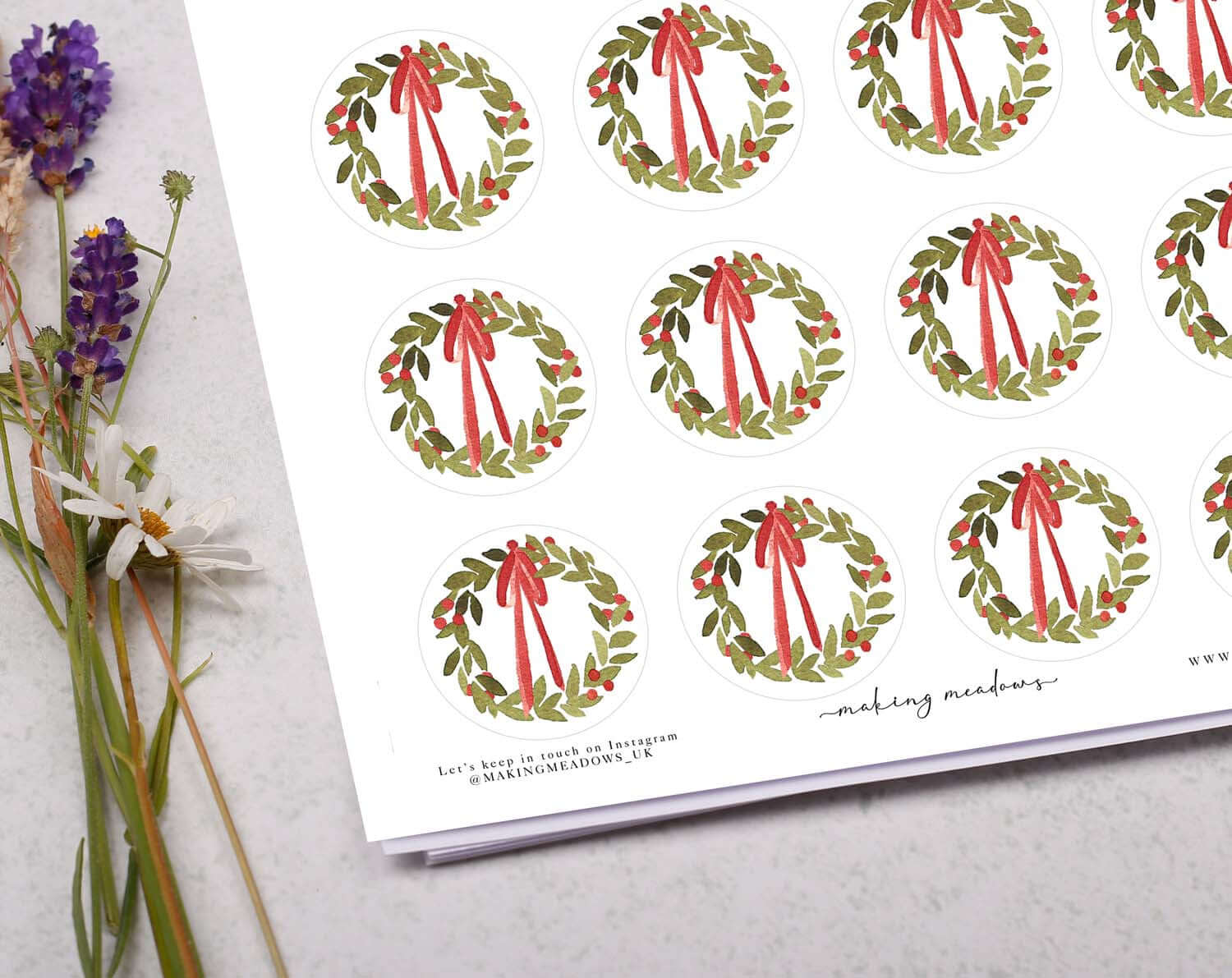 Christmas Wreath Stickers sheet featuring circular designs with festive ribbons and greenery.