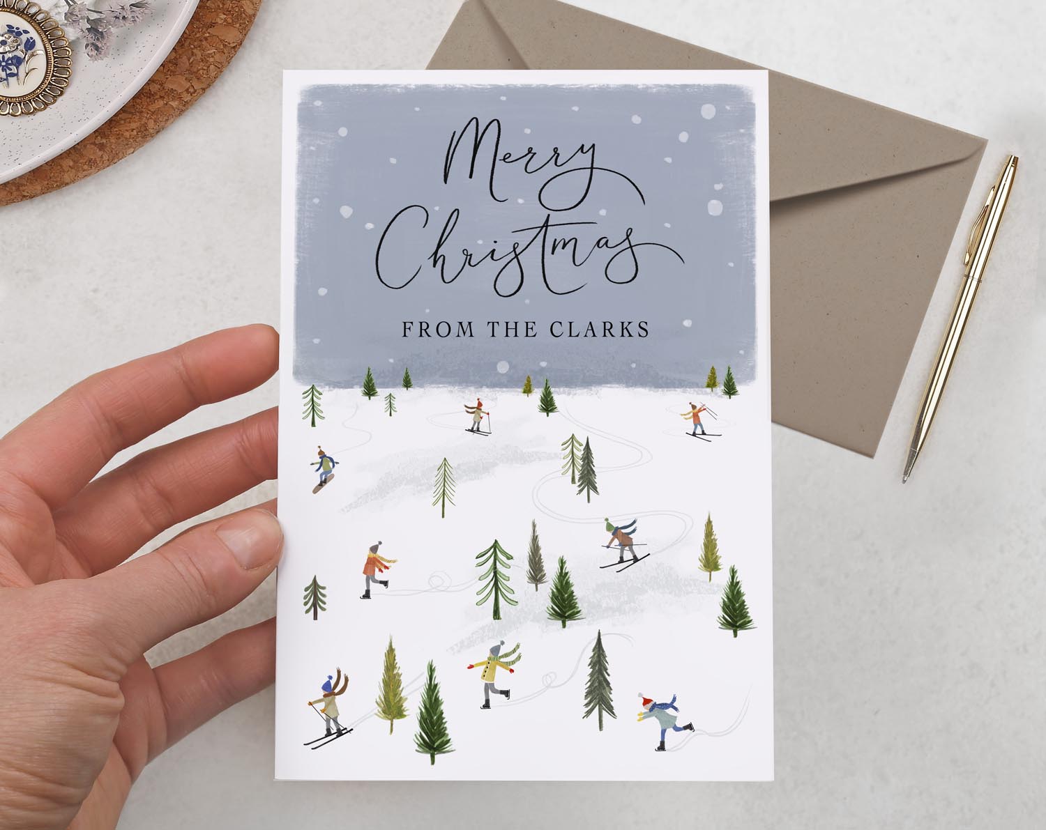 Personalised Christmas Card With Skiing Town