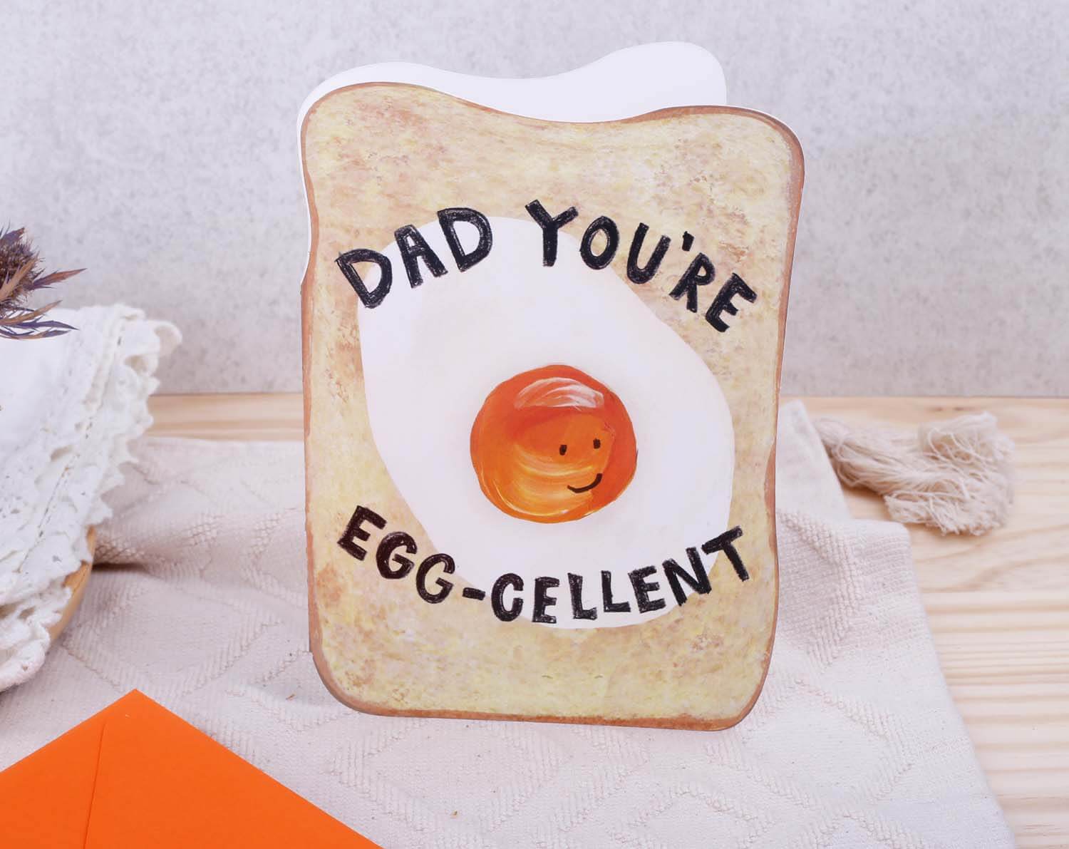Egg Funny Father's Day Card with a fun fried egg design saying 'Dad you're egg-cellent'.