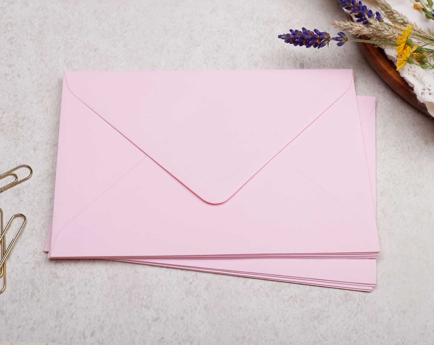 pack of light pink coloured C6 premium envelopes