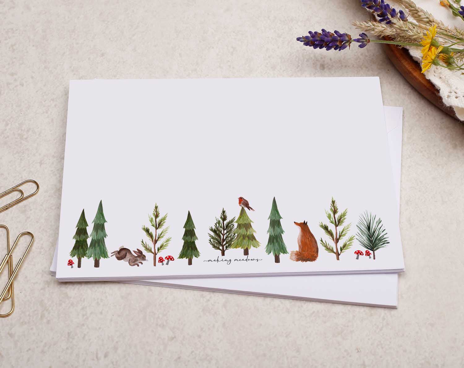 A pretty decorated C6 white envelope with a Woodland Fox Winter Forest Animal Design. 