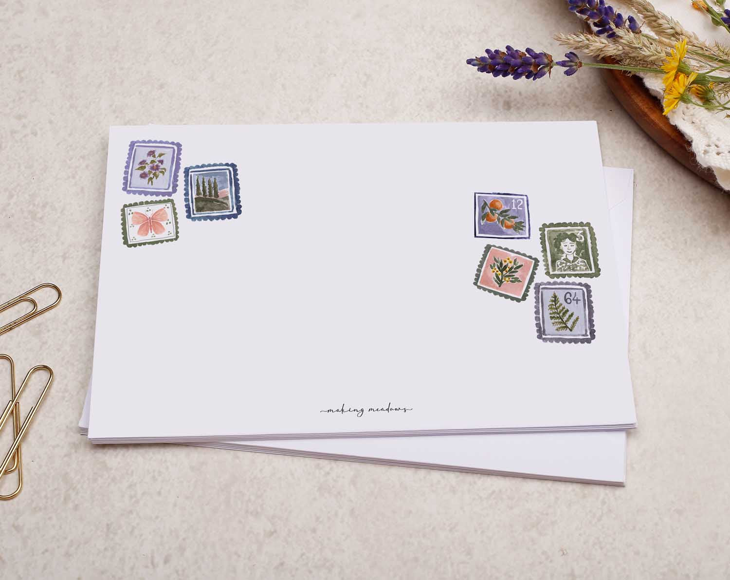 decorated C6 white envelope with a Watercolour Floral Flower Stamp Design.