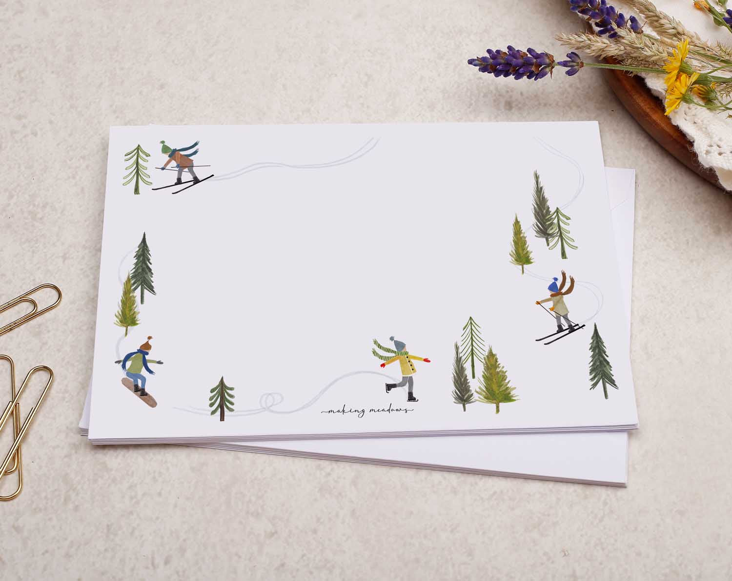 A pretty decorated C6 white envelope with a Winter Snow Skiing & Snowboarding Design.