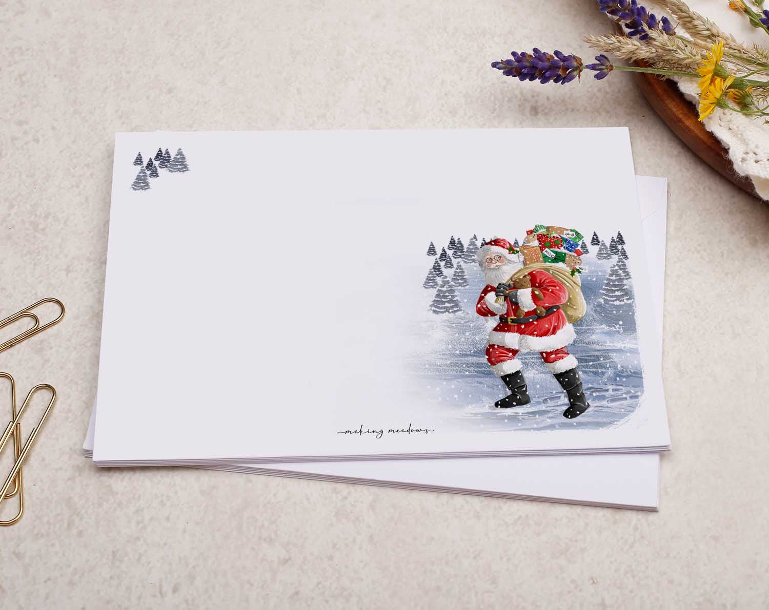 A pretty decorated C6 white envelope with a Traditional Father Christmas Santa Design. 