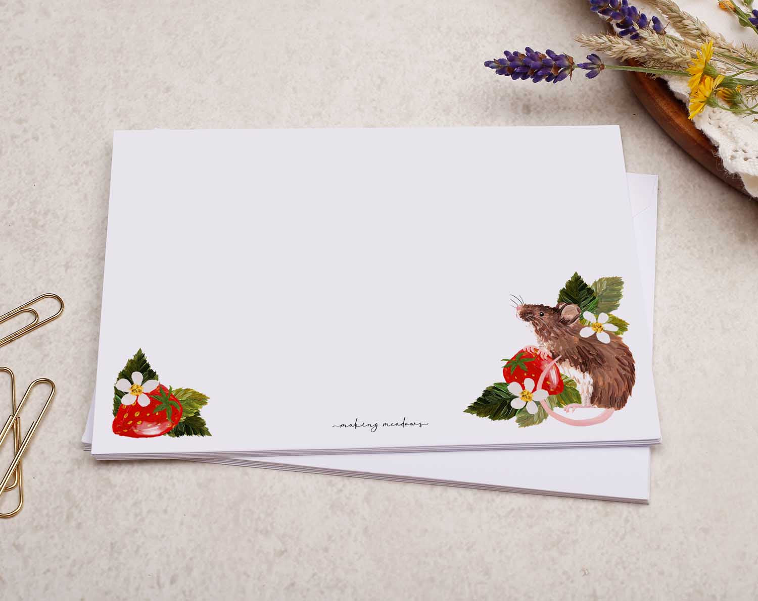 A pretty decorated C6 white envelope with a Vintage Strawberry Field Mouse Design.