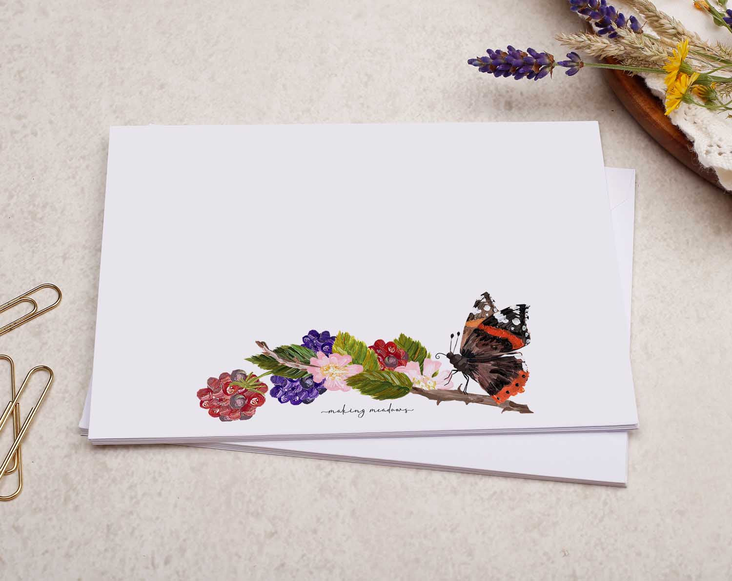 A pretty decorated C6 white envelope with a Hedgerow Butterfly & Blackberry Design. 