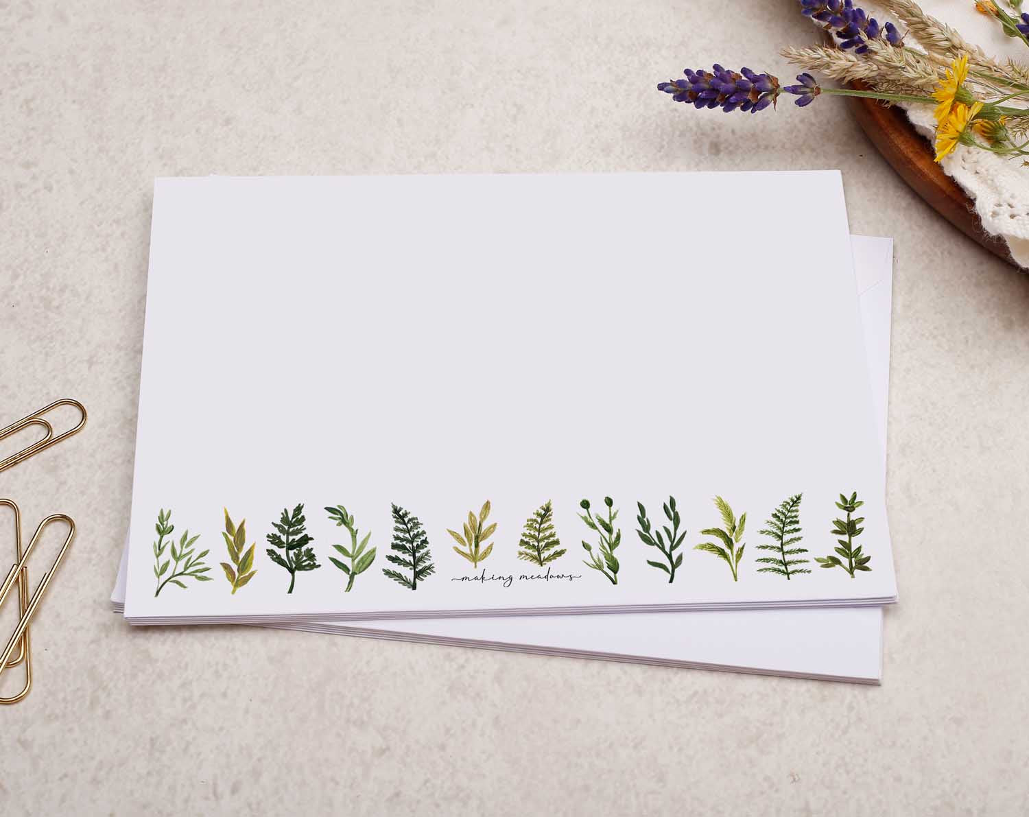 A pretty decorated C6 white envelope with a Rustic Botanical Green Leaf Design. 