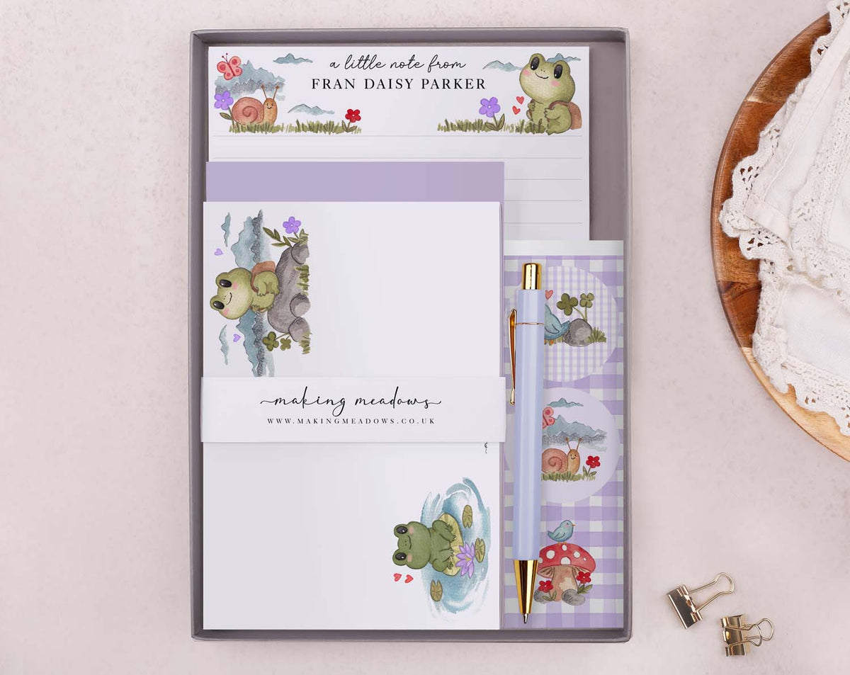 Personalised Children's Stationery Set featuring frog design, writing paper, envelopes, stickers, and luxury pen.