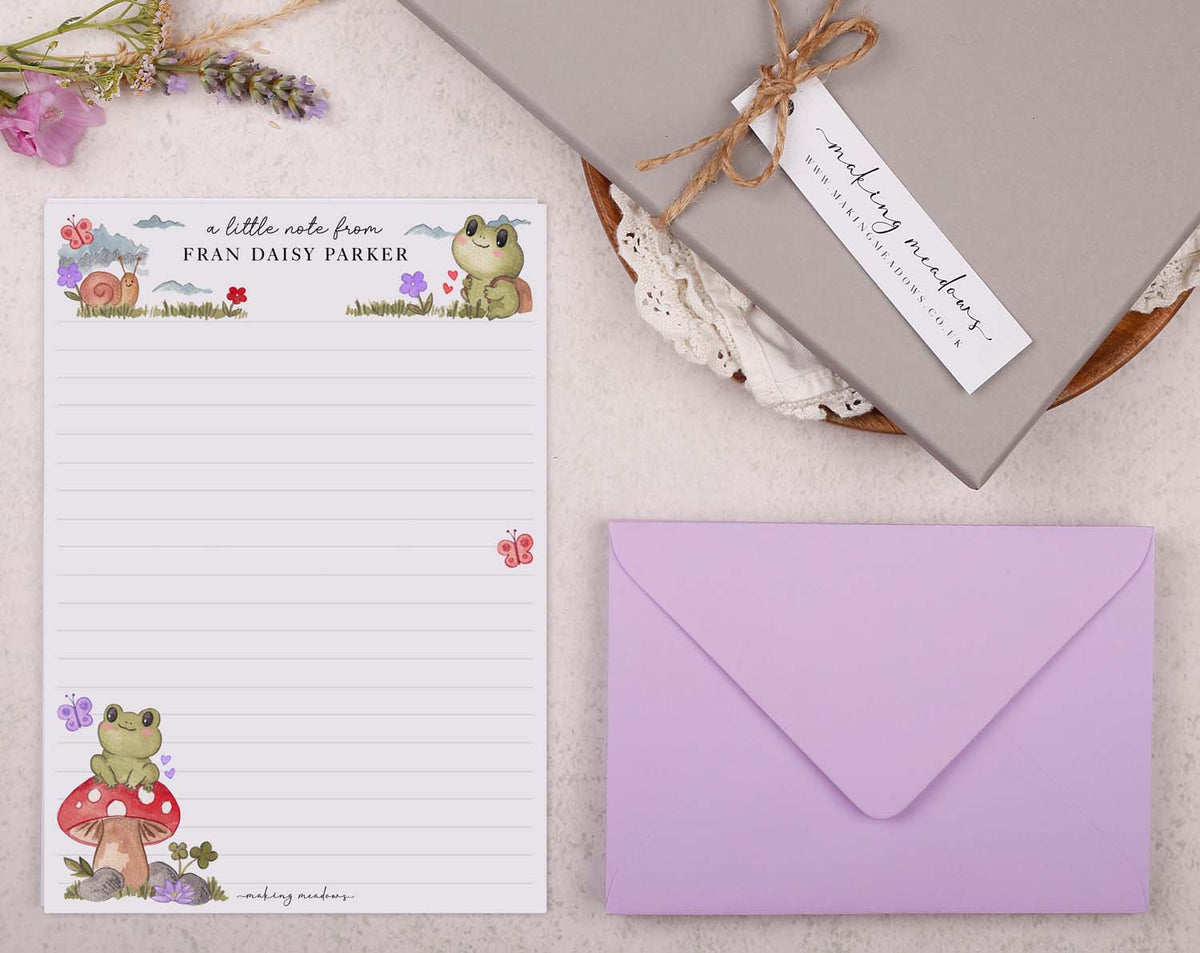 Personalised Children's Stationery Set featuring frog design, writing paper, and a purple envelope.