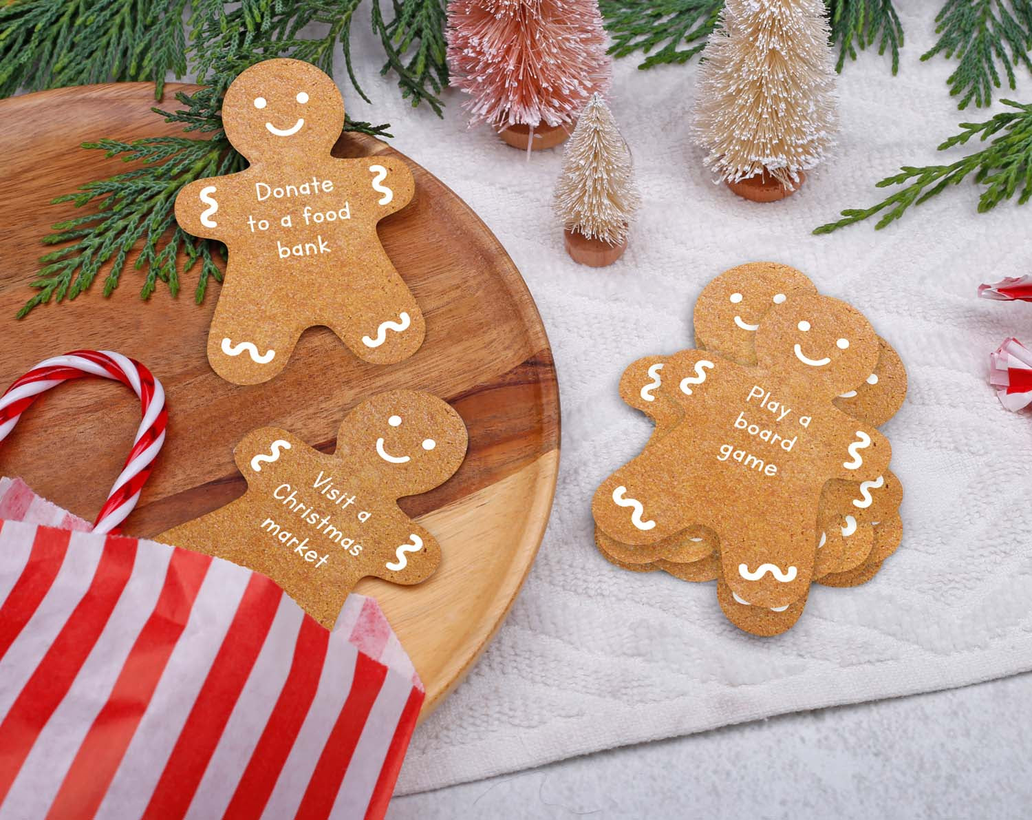 Gingerbread Activity Cards with festive activities like donating to a food bank and playing a board game.