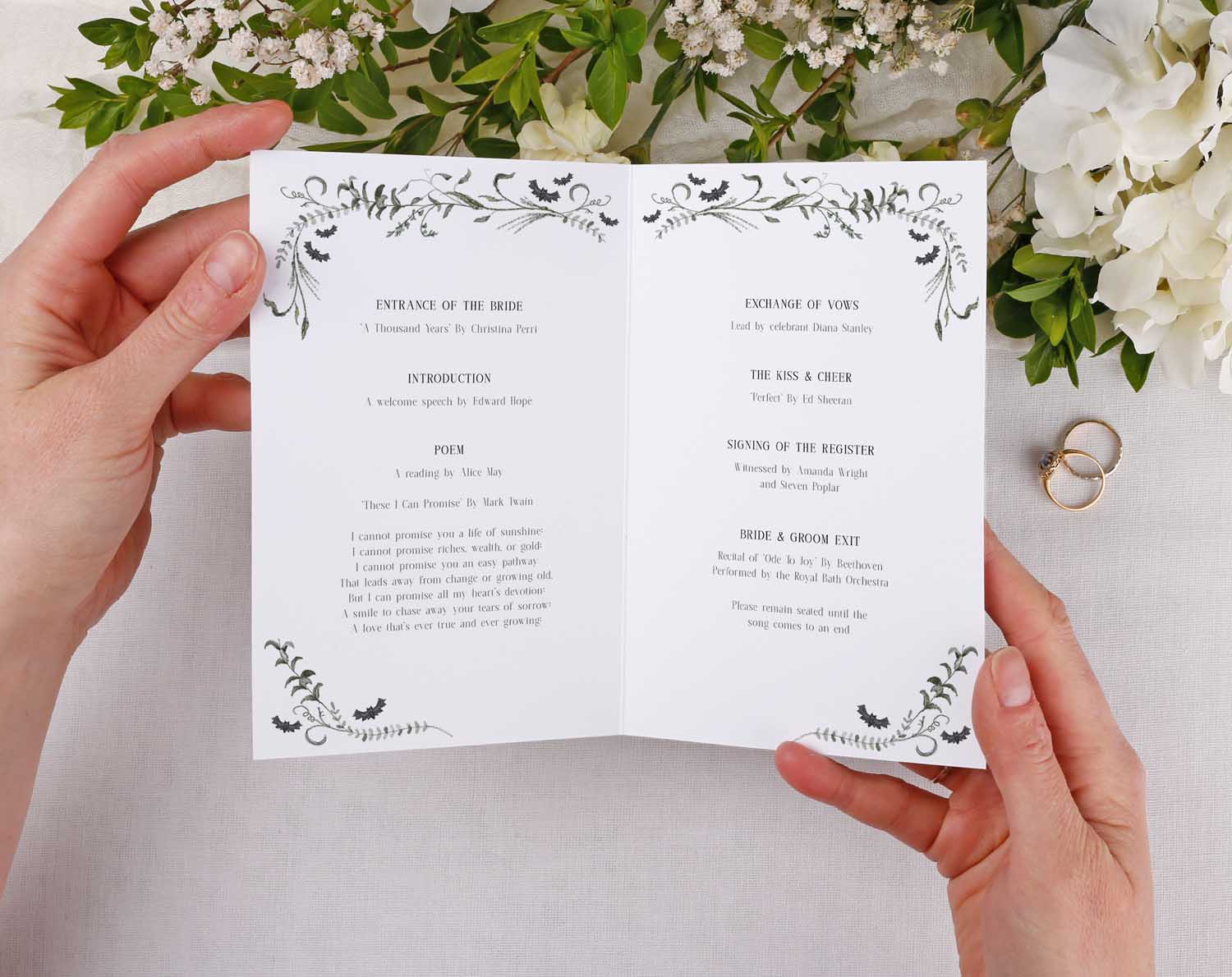 Open Gothic Order Of Service book featuring elegant floral designs and wedding ceremony details.