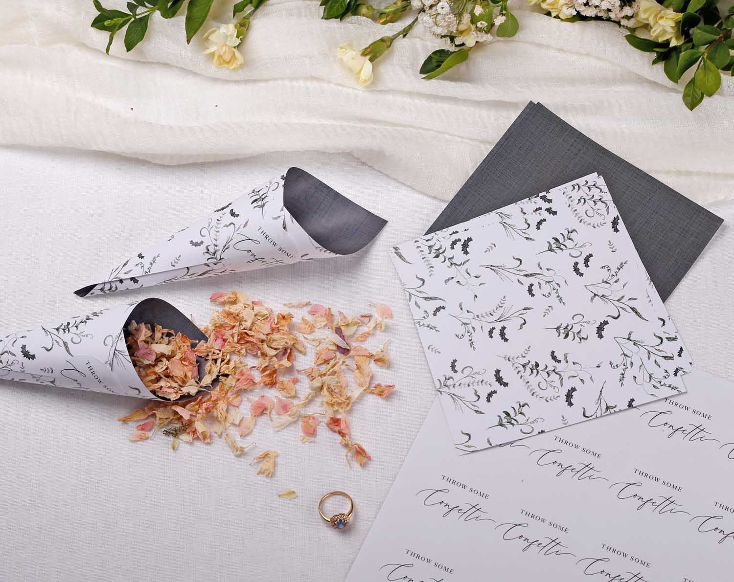 Gothic Wedding Confetti Cones displayed with flower petals and wedding decor for a ceremony.