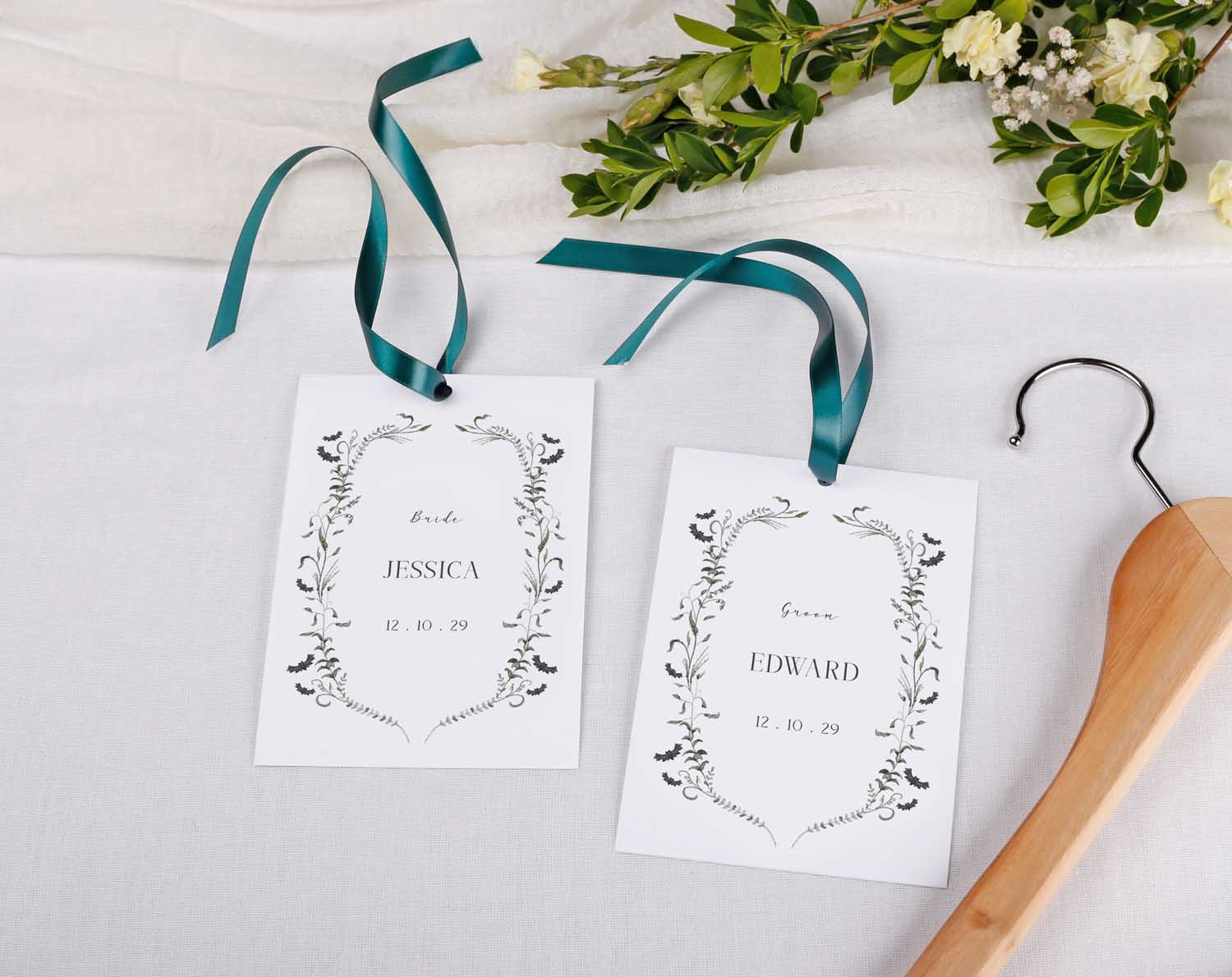 Gothic Wedding Hanger Tags for bridal party with elegant floral design and teal ribbons.