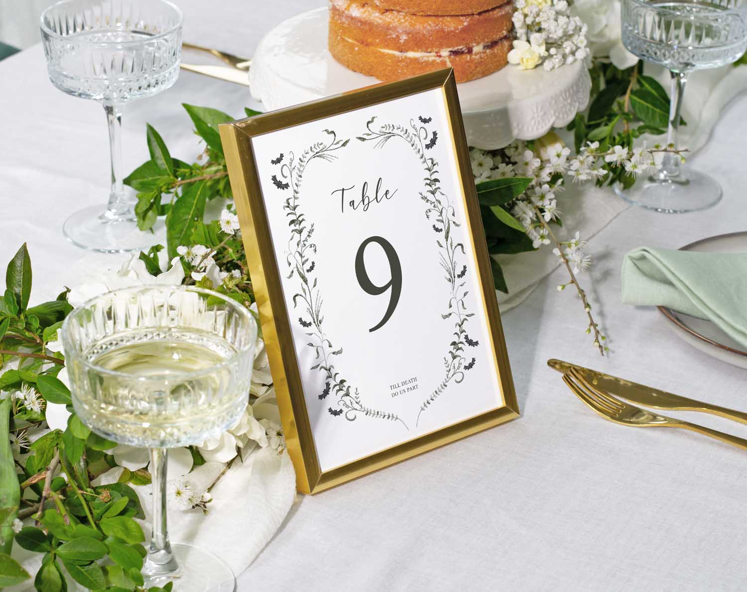 Elegant Gothic Wedding Table Numbers displaying Table 9 on a beautifully styled reception table with greenery.