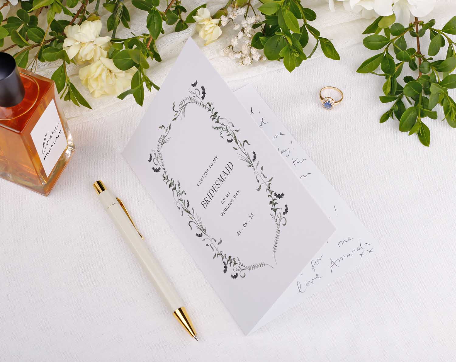 Gothic Wedding Thank You Card for bridal party featuring floral design and elegant typography on a desk.