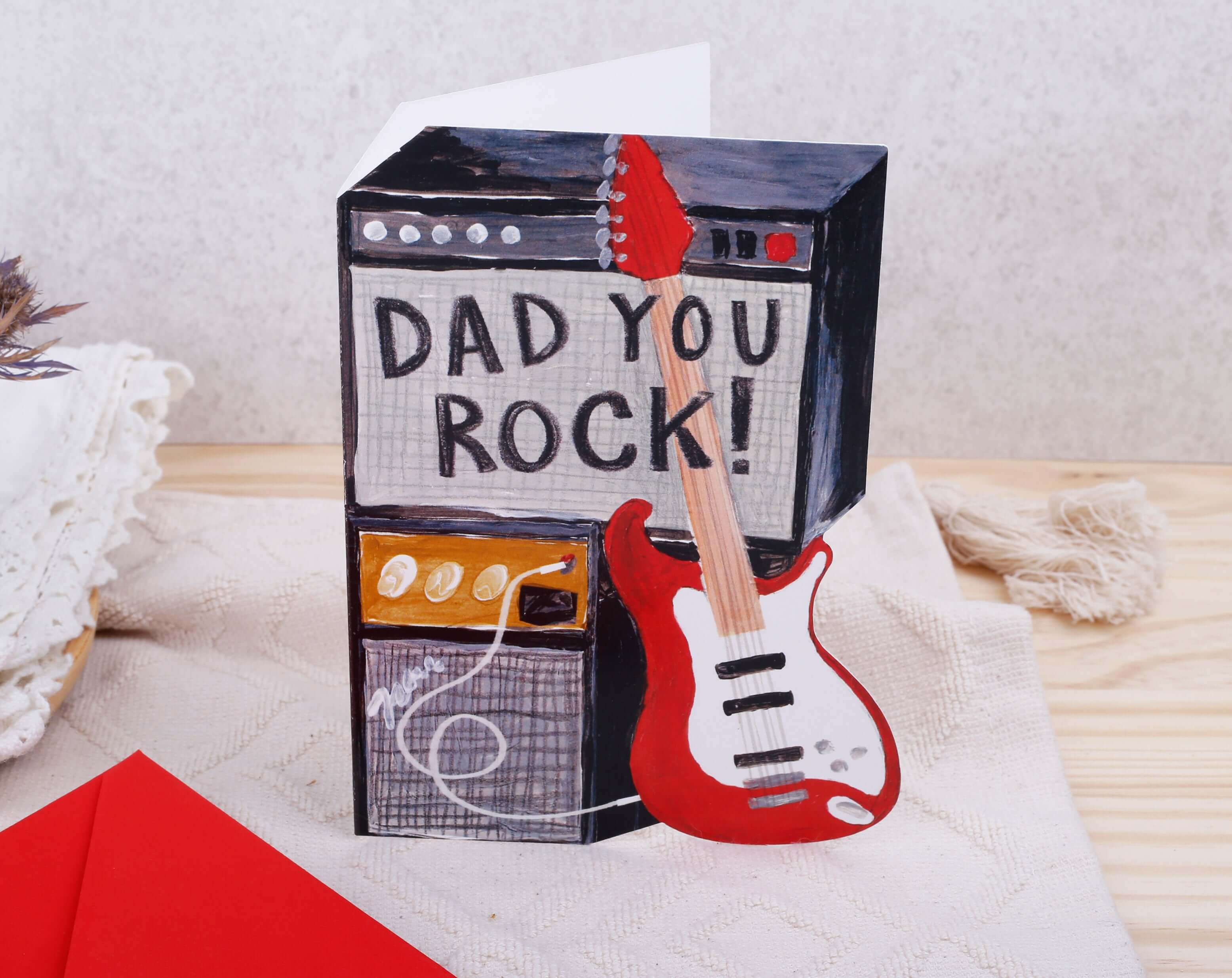 Rock Guitar Father's Day Card featuring an amp and guitar design that says 'DAD YOU ROCK!'