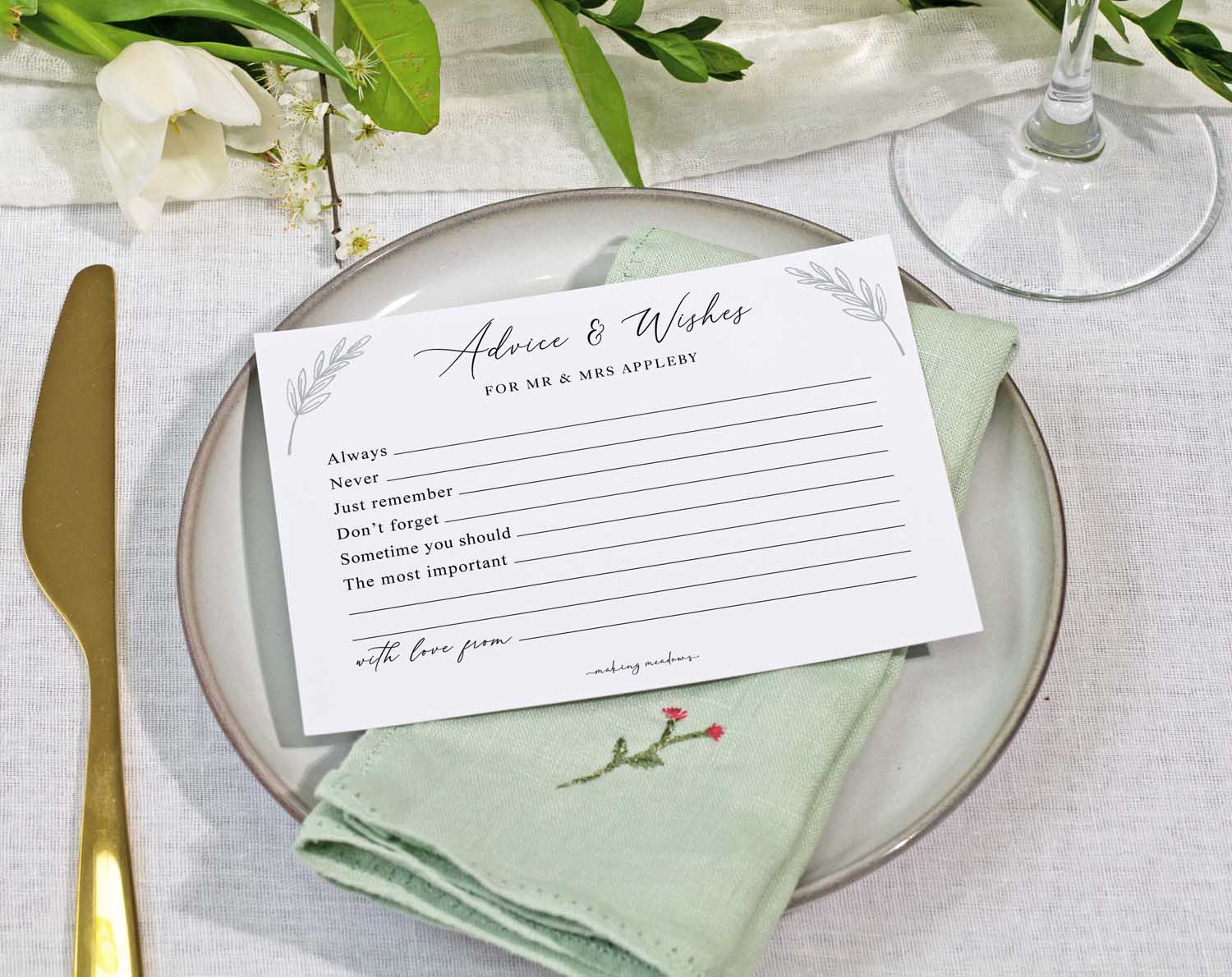 Minimalist Wedding Advice Cards placed on a dinner plate with a linen napkin, inviting guests for advice and wishes.