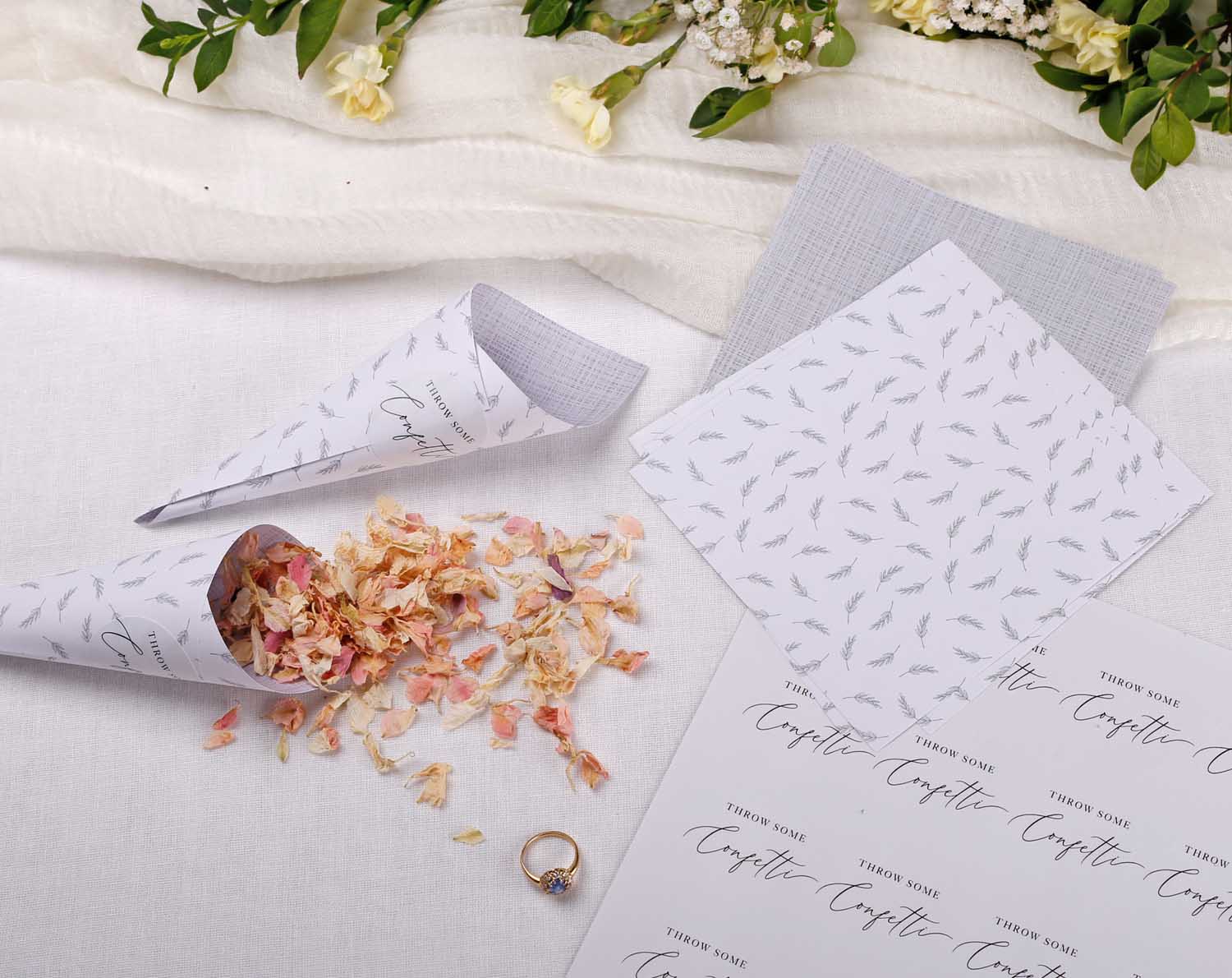 Minimalist Wedding Confetti Cones displayed with dried petals and wedding ring, perfect for a stylish ceremony.