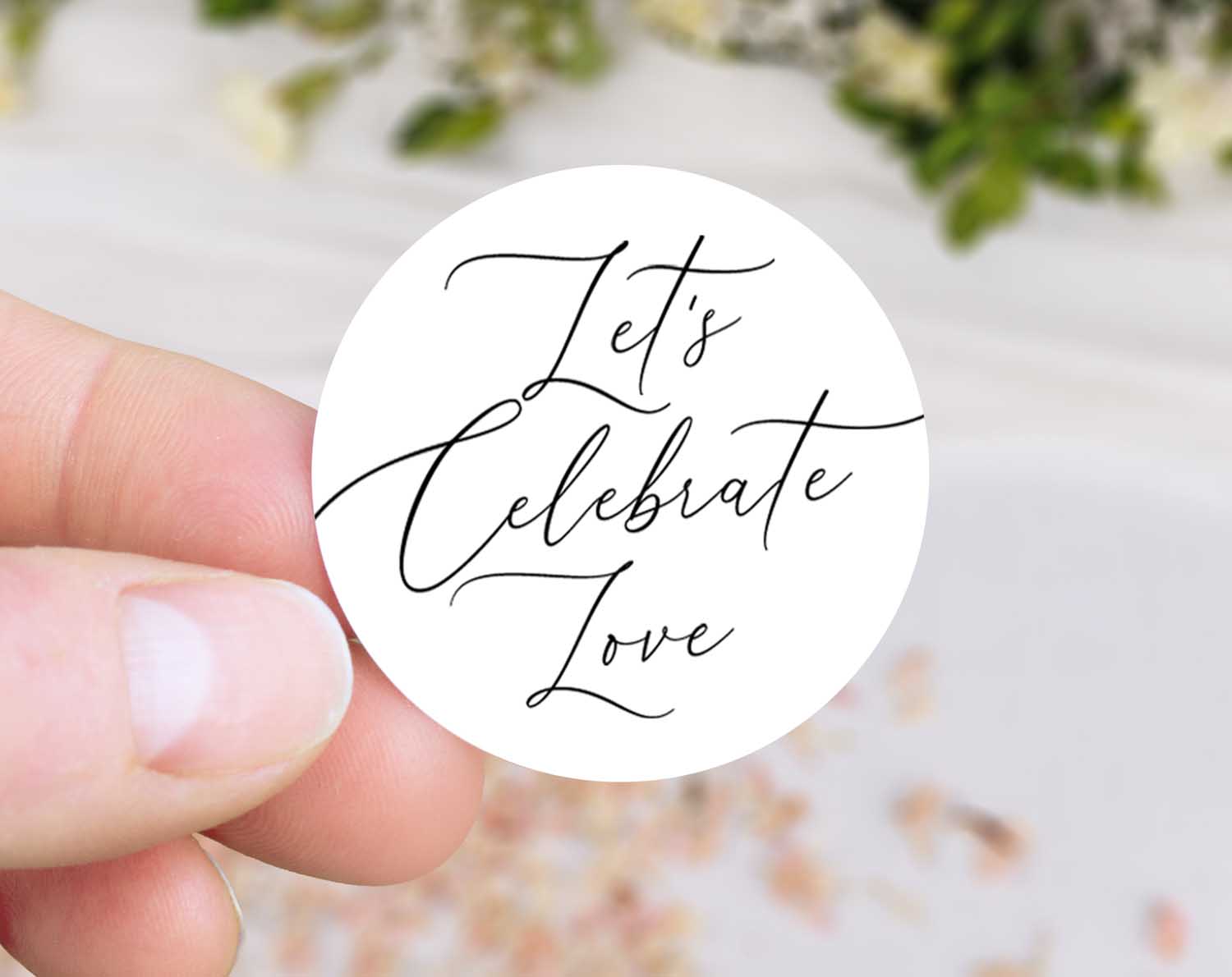 Minimalist Wedding Stickers featuring elegant calligraphy saying "Let's Celebrate Love" on a white background.
