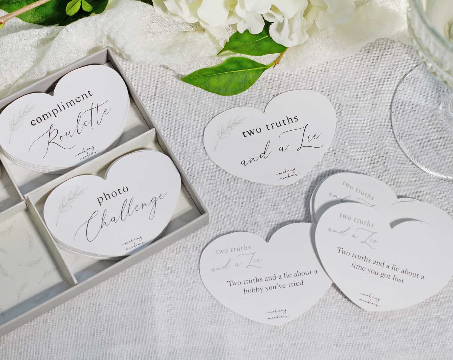 Minimalist Wedding Table Game with engaging icebreaker cards for guest interaction at weddings.