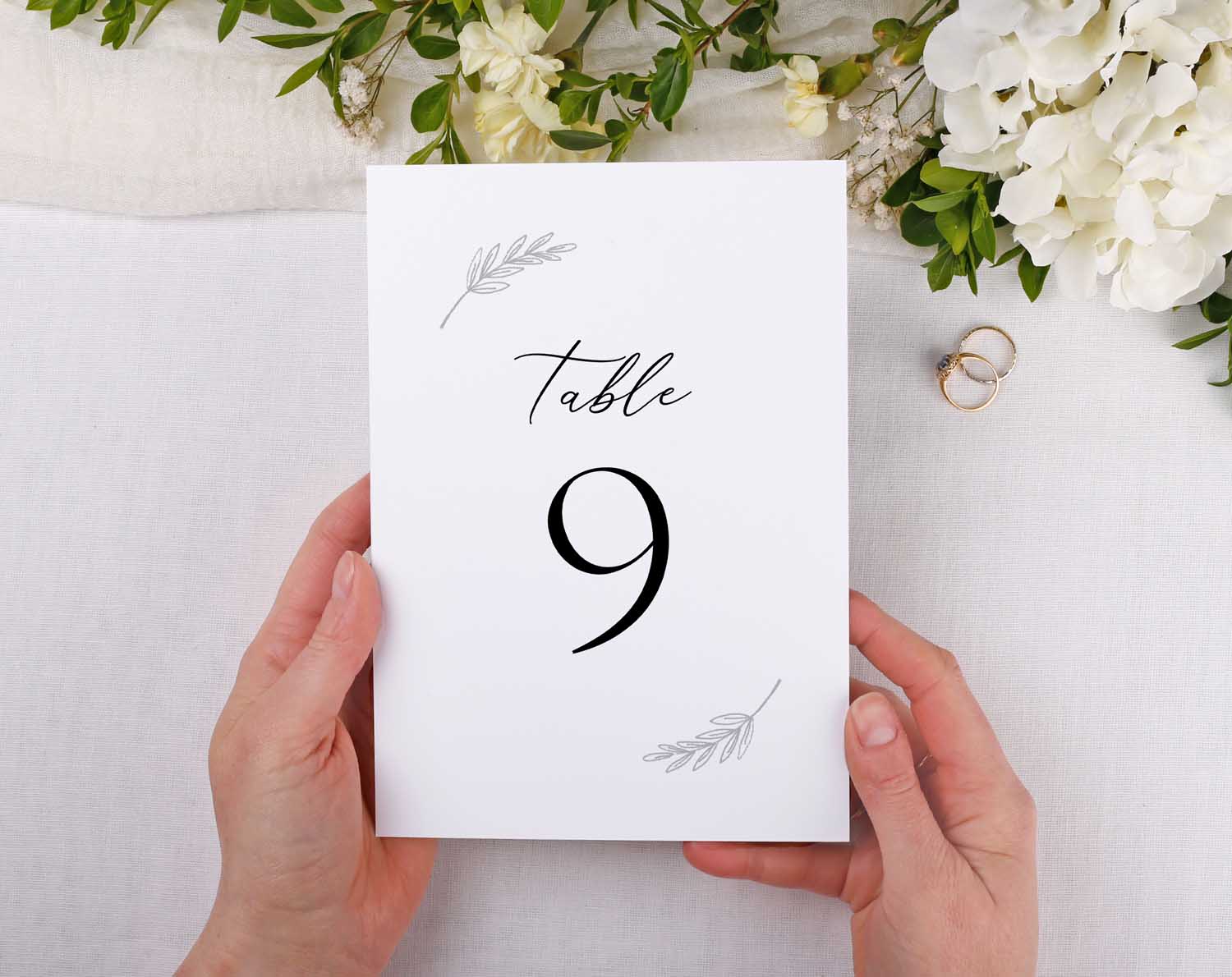 Minimalist Wedding Table Numbers displayed as Table 9 in elegant design with floral accents.