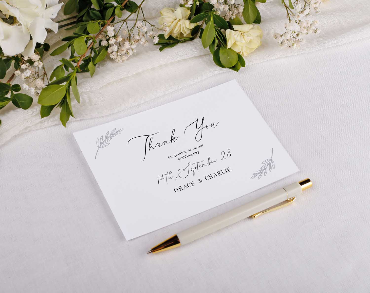 Minimalist Wedding Thank You Postcards featuring elegant script and floral accents on a stylish background.