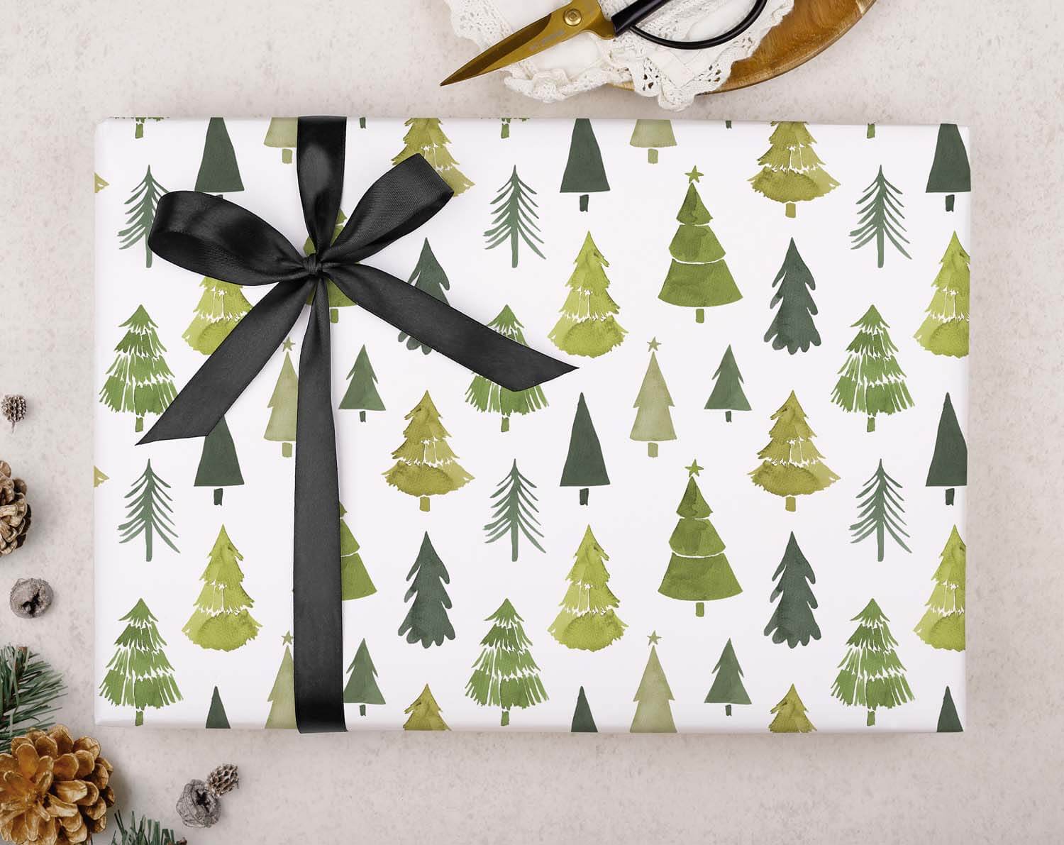 Modern Christmas Tree Wrapping Paper featuring a festive design with green trees and a black ribbon.