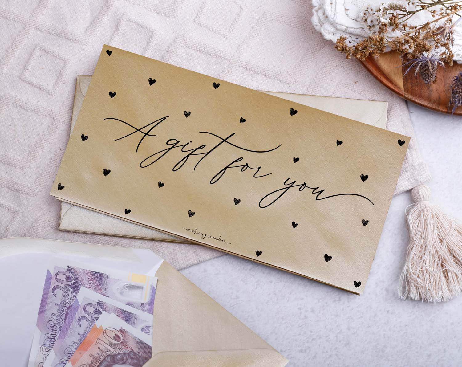 Gift For You Money Envelopes With Hearts on a soft background, showcasing a cash-filled envelope and heart pattern.