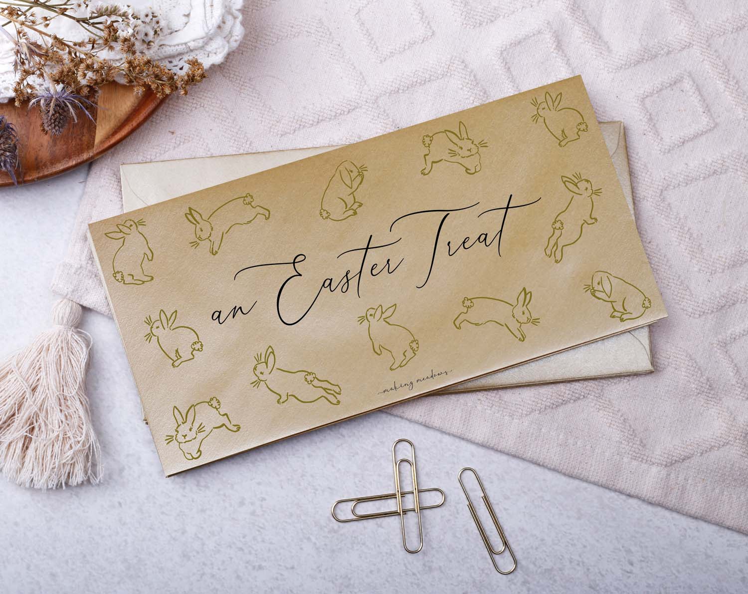 Easter Money Envelopes featuring bunny rabbit design and the words ‘An Easter Treat’ on a gold background.