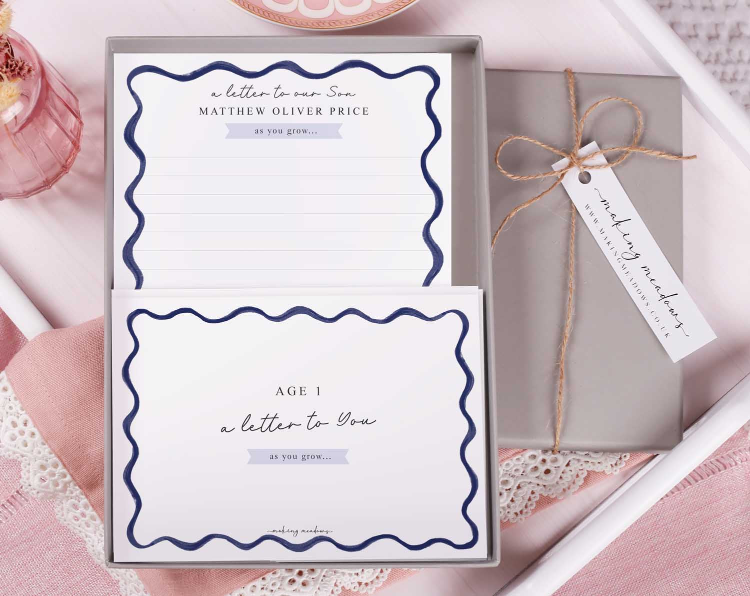 Personalised Blue Wavy Letter To Our Son displayed in a gift box with matching stationery for heartfelt messages.